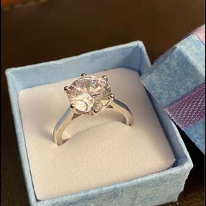 Sterling Silver 4 Cart Solitaire Ring